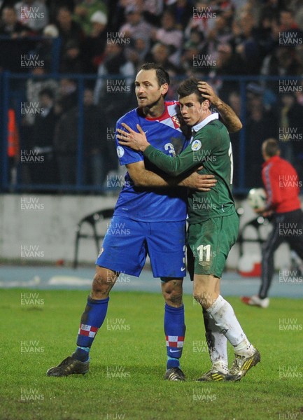 061012 - Croatia v Wales - World Cup QualifierWales' Gareth Bale congratulates Josip Simunic after the game  