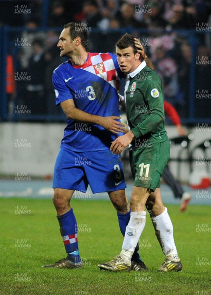 061012 - Croatia v Wales - World Cup QualifierWales' Gareth Bale congratulates Josip Simunic after the game  
