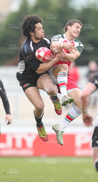 140412 - Ebbw Vale v Cross Keys…Cross Keys Leon Andrews takes high ball from Dorian Jones