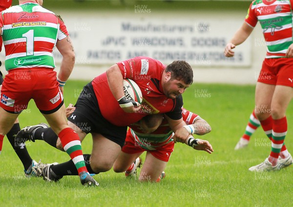 300814 Cross Keys v Ebbw Vale - British and Irish Cup Play off -Richard Cornock of Cross Keys is tackled by Ronny Kynes of Ebbw vale