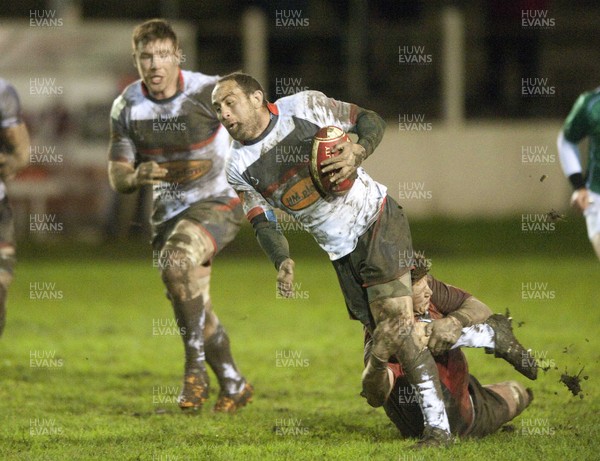 010213 -  Cross Keys v Newcastle Falcons - British and Irish Cup -    Newcastle's Jamie Helleur, left, is tackled by Cross Keys' Adam Powell