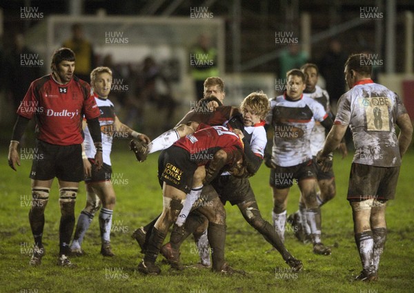 010213 -  Cross Keys v Newcastle Falcons - British and Irish Cup -    Newcastle's Joel Hodgson is tackled by Cross Keys'  Richard Cornock (hidden) and Dean Gunter