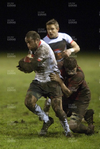 010213 -  Cross Keys v Newcastle Falcons - British and Irish Cup -    Newcastle's Jamie Helleur, left, is tackled by Cross Keys' Adam Powell