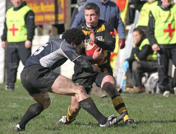 22.03.08 Cross Keys RFC. vs. Newport RFC. Principality Premiership, Cardiff. 
 
Gareth Wyatt is caught by opposite number Leon Andrews. 
 
