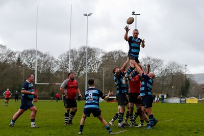 250323 - Cross Keys v Ystrad Rhondda - WRU Championship Cup Semi Final - Nathan Hughes of Ystrad Rhondda  wins a line out 