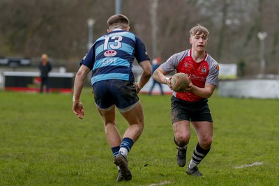 250323 - Cross Keys v Ystrad Rhondda - WRU Championship Cup Semi Final - Sam Berry of Cross Keys  and McCauley Rowley of Ystrad Rhondda 