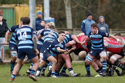 250323 - Cross Keys v Ystrad Rhondda - WRU Championship Cup Semi Final - Callum Phillips of Ystrad Rhondda passes ball out 