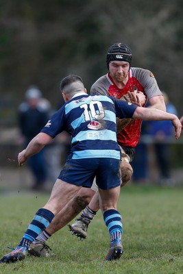 250323 - Cross Keys v Ystrad Rhondda - WRU Championship Cup Semi Final - Harvey Reader of Cross Keys  tailed by Rhys Truelove of Ystrad Rhondda