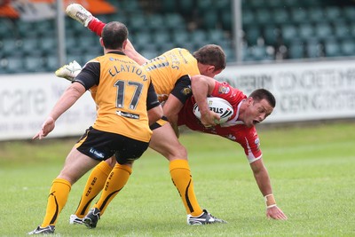 25.07.10.. Crusaders v Castleford Tigers, engage Super League Crusaders' Lincoln Withers is tackled by Castleford's Brett Ferres  