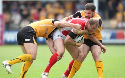 25.07.10.. Crusaders v Castleford Tigers, engage Super League Crusaders' Adam Peek is tackled 