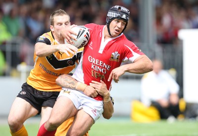 25.07.10.. Crusaders v Castleford Tigers, engage Super League -  Crusaders' Tony Martin is takes on the Castleford defence 