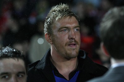 19.03.10 ... Crusaders v Catalans Dragons, engage Super League -  Cardiff Blues and Wales rugby player Andy Powell watches from the touchline before the start of the match 