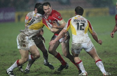 19.03.10 ... Crusaders v Catalans Dragons, engage Super League -  Crusaders' Mark Bryant takes on Catalans' Gregory Mounis  