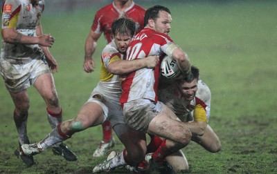 19.03.10 ... Crusaders v Catalans Dragons, engage Super League -  Crusaders' Mark Bryant is tackled  