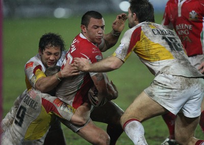 19.03.10 ... Crusaders v Catalans Dragons, engage Super League -  Crusaders' Jason Chan is tackled  