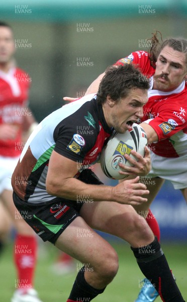 06.08.10 .. Crusaders v Harlequins RL, engage Super League -  Harlequins' Like Dorn takes the ball as Crusaders' Jarrod Sammut closes in 