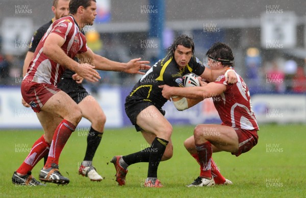 11.07.09 - Celtic Crusaders v Salford City Reds - engage Super League - Matt Smith of Celtic Crusaders is tackled by Luke Adamson of Salford City Reds. 