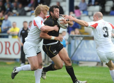 24.05.08 - Rugby League, Northern Rail Cup Quarter Final Celtic Crusaders v Widness Vikings Crusaders' Mark Dalle Cort crosses to score try despite the efforts od Vikings' Iain Morrison and Lee Paterson 