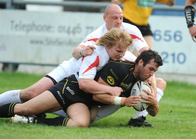 24.05.08 - Rugby League, Northern Rail Cup Quarter Final Celtic Crusaders v Widness Vikings Crusaders' Mark Dalle Cort crosses to score try despite the efforts od Vikings' Iain Morrison and Lee Paterson 