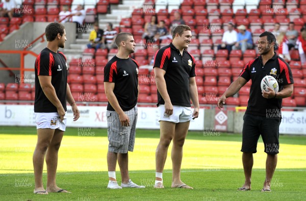 27.06.10 - Crusaders v Wakefield Wildcats - Engage Super League -  Crusaders Jason Chan, right, and other members of the squad pass the time as they wait for the Wakefiled coach to arrive 