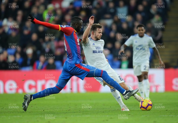 261218 - Crystal Palace v Cardiff City, Premier League - Joe Ralls of Cardiff City is challenged by Cheikhou Kouyate of Crystal Palace