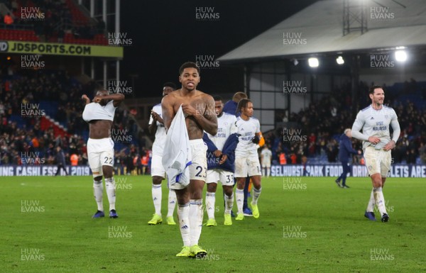 261218 - Crystal Palace v Cardiff City, Premier League - Cardiff City players give their match shirts to the travelling supporters at the end of the match