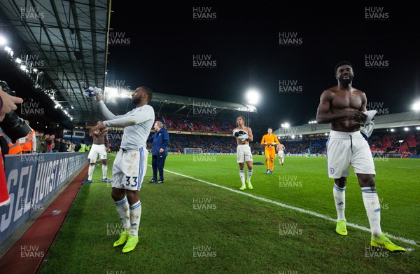 261218 - Crystal Palace v Cardiff City, Premier League - Cardiff City players hand over their match shirts to travelling supporters at the end of the match