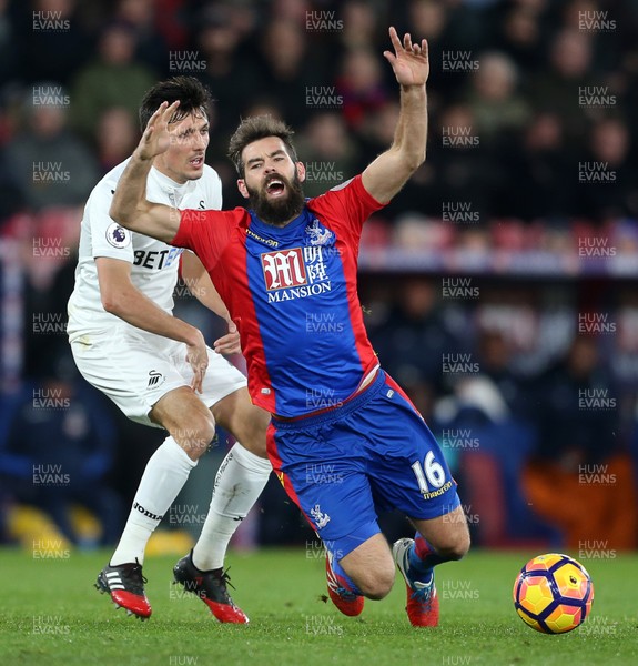 030117 - Crystal Palace v Swansea City - Premier League - Joe Ledley of Crystal Palace is tackled by Jack Cork of Swansea City by Chris Fairweather/Huw Evans Agency