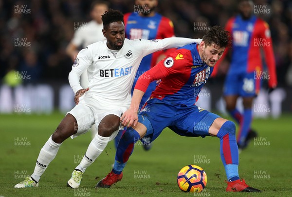 030117 - Crystal Palace v Swansea City - Premier League - Nathan Dyer of Swansea City is tackled by Joel Ward of Crystal Palace by Chris Fairweather/Huw Evans Agency