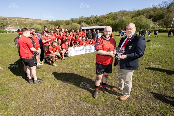 250426 - Cwmafan v Bryncoch, Admiral National League 3 West Central - Captain Ashley Mortimer is presented the trophy by Steve Owen