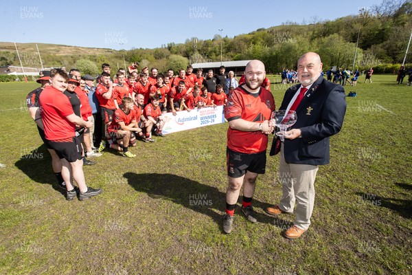 250426 - Cwmafan v Bryncoch, Admiral National League 3 West Central - Captain Ashley Mortimer is presented the trophy by Steve Owen