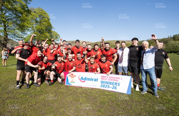 250426 - Cwmafan v Bryncoch, Admiral National League 3 West Central - Captain Ashley Mortimer lifts the trophy alongside team mates