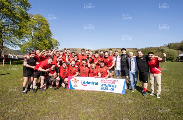 250426 - Cwmafan v Bryncoch, Admiral National League 3 West Central - Captain Ashley Mortimer lifts the trophy alongside team mates