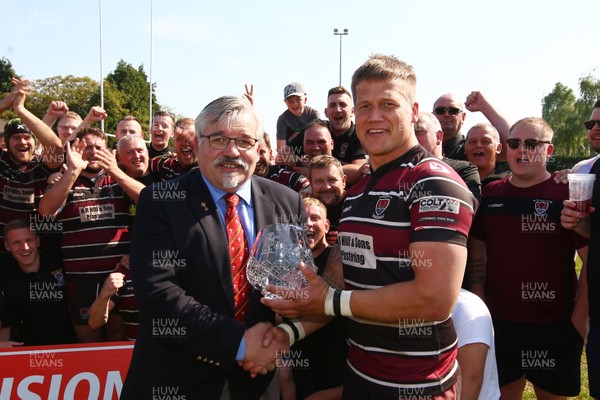 190518 - Cwmbran RFC v Hartridge RFC - WRU National Division 2 East - Captain of Hartridge RFC Michael Wrench receives the league trophy from Bryn Parker of WRU  