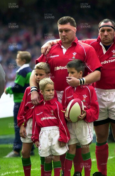 131001 - Wales v Ireland -  Dai Young sings the Welsh Anthem with his three children, (L-R) Thomas, Owen and Lewis,  on his 50th game for Wales