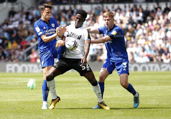 070522 - Derby County v Cardiff City - Sky Bet Championship - Malcolm Ebiowei of Derby and Perry Ng of Cardiff and Joel Bagan of Cardiff