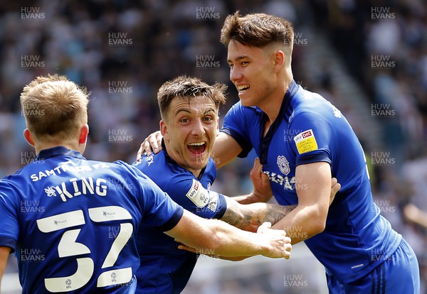 070522 - Derby County v Cardiff City - Sky Bet Championship - Jordan Hugill of Cardiff celebrates scoring the 1st goal of the match with Eli Ling of Cardiff and Rubin Colwill