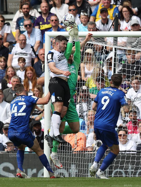 070522 - Derby County v Cardiff City - Sky Bet Championship - Goalkeeper Dillon Phillips of Cardiff saves from Eiran Cashin of Derby in the 1st half