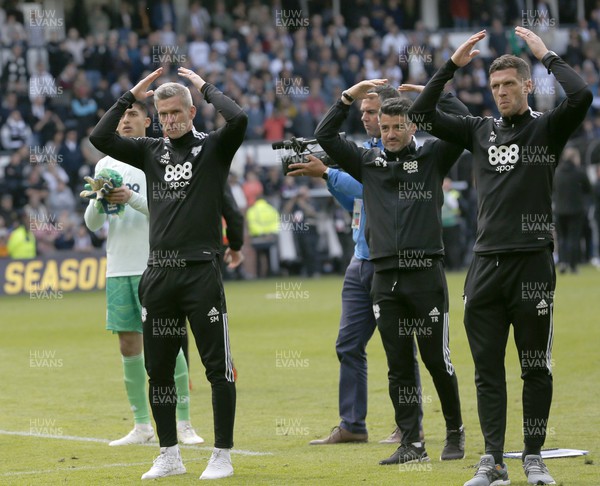070522 - Derby County v Cardiff City - Sky Bet Championship - Manager Steve Morison of Cardiff and staff perform the Ayatollah