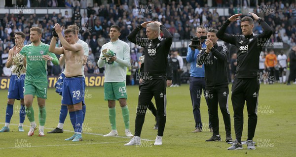 070522 - Derby County v Cardiff City - Sky Bet Championship - Manager Steve Morison of Cardiff, staff and players perform the Ayatollah