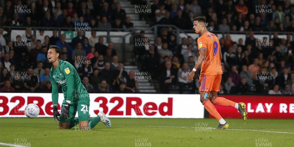 130919 - Derby County v Cardiff City - Sky Bet Championship -  Robert Glatzel of Cardiff scores a penalty past Kelle Roos of Derby