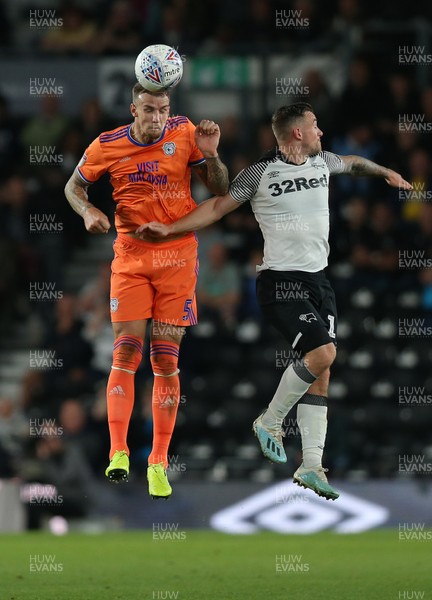 130919 - Derby County v Cardiff City - Sky Bet Championship -  Aden Flint of Cardiff and Jack Marriott of Derby