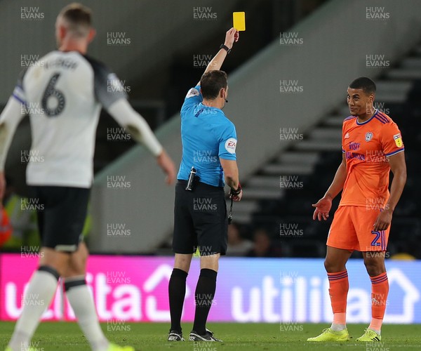 130919 - Derby County v Cardiff City - Sky Bet Championship -  Lee Peltier of Cardiff gets a yellow card in the 1st half