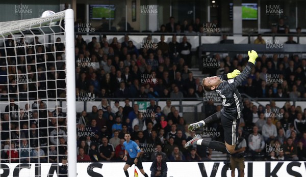 130919 - Derby County v Cardiff City - Sky Bet Championship -  A shot from Graeme Shinnie of Derby hits the crossbar