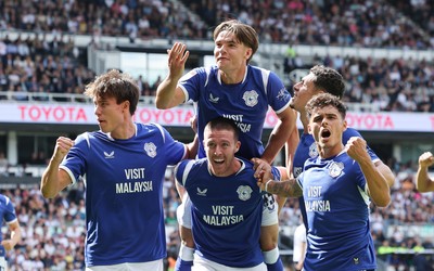 220826 - Derby County v Cardiff City, EFL Sky Bet Championship - Cian Ashford of Cardiff City celebrates on the shoulders of Jack Moylan of Cardiff City after scoring the first goal