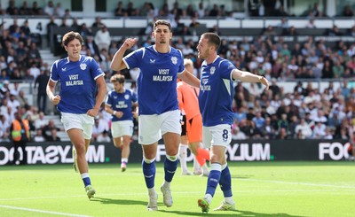 220826 - Derby County v Cardiff City, EFL Sky Bet Championship - Yousef Salech of Cardiff City, centre, celebrates after scoring City’s second goal