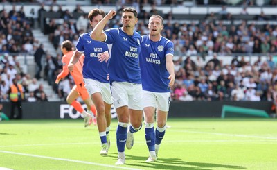 220826 - Derby County v Cardiff City, EFL Sky Bet Championship - Yousef Salech of Cardiff City, centre, celebrates after scoring City’s second goal