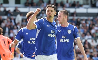 220826 - Derby County v Cardiff City, EFL Sky Bet Championship - Yousef Salech of Cardiff City, centre, celebrates after scoring City’s second goal