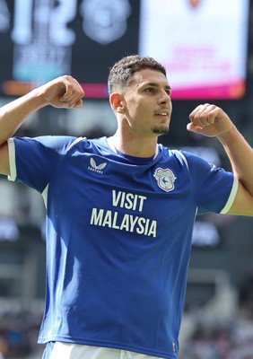 220826 - Derby County v Cardiff City, EFL Sky Bet Championship - Yousef Salech of Cardiff City, centre, celebrates after scoring City’s second goal
