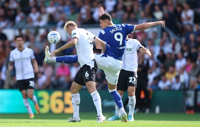 220826 - Derby County v Cardiff City, EFL Sky Bet Championship - Yousef Salech of Cardiff City and Sondre Langas of Derby County compete for the ball